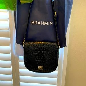 Brahmin Croc embossed leather saddlebag with flap.
